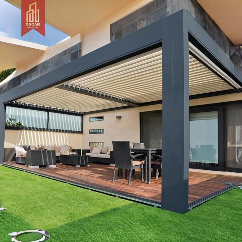 Dark grey wall-mounted pergola with a light louvered roof beside patio doors